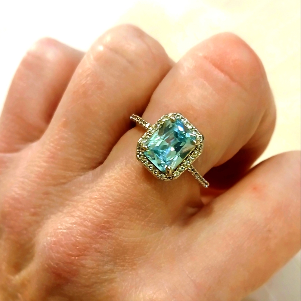 Dazzling Silver Ring with Sky Blue Gemstone